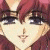 Pixelated anime-style character with reddish-brown hair and dark eyes, next to green background with bright green text.