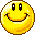 Yellow circular pixelated face with black eyes and mouth, showing various toothed grins