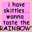 Pixelated text on pink background with yellow border, displaying 'i have skittles.. wanna taste the RAINBOW' in four repeated