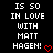 Pixelated text on black background reads 'IS 50 IN LOVE WITH MATT HAGEN!' with red heart symbol, two identical frames side-by-side.
