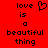 Red background with black pixelated text reading 'love is a beautiful thing' and a heart symbol on the left side.