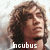 Pixelated portrait of a person with brown curly hair and light skin, featuring the text 'Incubus' at the bottom.