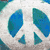 A static image showing four distinct sections: a pixelated peace symbol, a glowing heart outline with sparkles, green text on pink background, and empty gray space.
