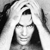 Black-and-white pixelated icon of a person with dark hair and a sleeveless top, rendered in low-resolution grayscale with visible dithering and anti-aliasing effects.