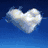 Animated cloud-shaped heart floats against blue sky, transitions to red apple with heart cutout, then tic-tac-toe with hearts, finally heart-shaped tree with glowing heart