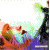 Pixelated image with text fragments and a small heart symbol, featuring colorful abstract shapes on the left side.