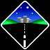 Pixelated diamond-shaped icon with blue sky, green hills, city skyline, and road; gray rock moves across the road in