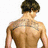 A pixelated image of a shirtless man with short brown hair viewed from behind, standing against a white background next to pink text on a beige
