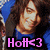 Pixelated image of a person with long dark hair wearing blue clothing against a blue background, with pink text at the bottom.