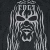 Pixelated grayscale icon of a stylized human face with exaggerated features and long hair, rendered in low-resolution 256x256 pixels on a dark background.