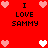 Red background with pixelated hearts and repeated text "I LOVE SAMMY" in black block letters.