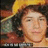 Pixelated image of a person with curly hair wearing a yellow hat, surrounded by red text reading "Nick is" and "Hot!!" on a black background.