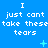 Blue background with repeated white text 'I just cant take these tears' and small cyan symbols scattered across the image.