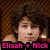 A pixelated image of a person with curly brown hair, wearing a red garment and holding a microphone, with pink text reading "Elisah + Nick" overlaid on the left side.