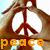 A pixelated icon featuring a peace symbol with brown arms and white center, surrounded by an orange 'peace' text at the bottom.