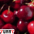 Red cherries with stems fill the frame, each cherry glossy and deep red; white text reading YUMMY appears in a black rectangle at bottom-left corner.