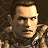 Pixelated image of a man with short brown hair and light skin wearing a textured garment, next to large orange-yellow 'DOOM 3' text on black background.