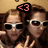 Two people with long brown hair wearing white sunglasses pose closely together under a pink '<3' symbol on black background.