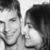 Black-and-white photo of two people in close proximity with a colorful 'a lot Love' text overlay on the right side.