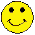 Six yellow smiley faces with black eyes and brown mouths arranged in two on a gray background, each showing distinct mouth expressions including closed smiles, open grins, and one with red lips