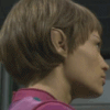 A sequence of showing a person with short brown hair in profile, wearing a pink top, transitioning to a person with short brown hair in profile, wearing a dark top