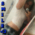 A pixelated image shows a person holding a glowing object with blue text 'SMILE' vertically aligned on the left side.