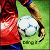Pixelated image of a figure in red clothing holding a white spherical object against a green background with partial text.