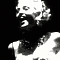 Black-and-white animated sequence showing a woman with styled hair and a beaded necklace in a laughing pose