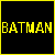 Four- with black, white, and blue backgrounds; yellow 'BATMAN' text in top-left; multicolored 'OWNS' text in top-right; black 'SUPER MAN' text on white background bottom-left; pixelated Batman logo with red X overlays on blue background bottom-right