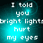 Pixelated cyan text on dark background reads "I told you bright lights hurt my eyes" with a subtle glow effect.