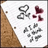 Pixelated icon with brown triangular shape on left, gray abstract symbol in center top, dark red heart cluster on right, and scattered gray shapes below.