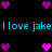 Pixelated blue text "I love jake" repeats across black background with scattered pink and purple heart icons.