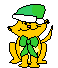 Yellow cartoon cat wearing green Santa hat and bow tie, standing with one arm raised against gray background.