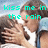 Two people in white shirts kiss under a cloudy sky with cyan text reading "kiss me in the rain" and a cyan number 3.