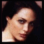 Two side-by-side pixelated close-up views of a person's face with dark hair, showing different angles and lighting.