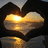 A heart-shaped frame of hands holds a sunset over water, with blue pixelated text on yellow background reading "summer 08 (333)" and "Loving every moment of it<3 to stayin out late to hanging out with friends<3".