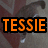 A cat with brown and white fur stands on a patterned floor, with text and symbols changing above it.
