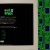 A pixelated CRT screen display with a green monitor icon on a dark background, surrounded by a light gray border and adjacent to a green patterned column.
