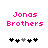 Pixelated pink text 'Jonas Brothers' above a of black and gray puzzle pieces on white background