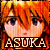 Pixelated anime-style icon featuring a character with orange hair and large eyes, set against a fiery background with the name "ASUKA" displayed below in blocky text.