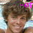 A person with brown curly hair and a light blue shirt appears in a of four with pink text "HOT" visible in the top-left, top-right, and bottom-left