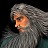 Pixelated static image of a character with long grey hair and beard, orange skin, dark eyes, and a neutral expression against a dark background.