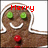Pixelated gingerbread man with green eyes and red buttons, smiling against white background; text changes from 'Merry' to 'Christmas'.