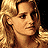 Static image of a woman with blonde hair and brown eyes, featuring text 'Dirty Dancing' and 'HAVANA NIGHTS' in stylized fonts over a pixelated background.
