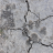 Static pixelated image with abstract gray and white patterns, no discernible subjects or text elements visible.