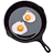 Pixelated image of a frying pan with two fried eggs on a white background, surrounded by blue text on green