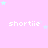 Pixelated pink background with repeated white text 'shortie' and scattered cyan stars, partially obscured by a gray rectangle.