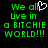 Green pixelated text on black background reads "We all live in a BITCHIE WORLD!!!" with white heart symbol replacing 'l' in 'all'.
