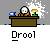 Pixelated animation of a character in an orange jumpsuit at a desk with blue and yellow objects, drooling with visible text below.