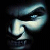 Pixelated image of a stylized figure with elongated limbs and curved shapes in blue, white, and black tones against dark background.